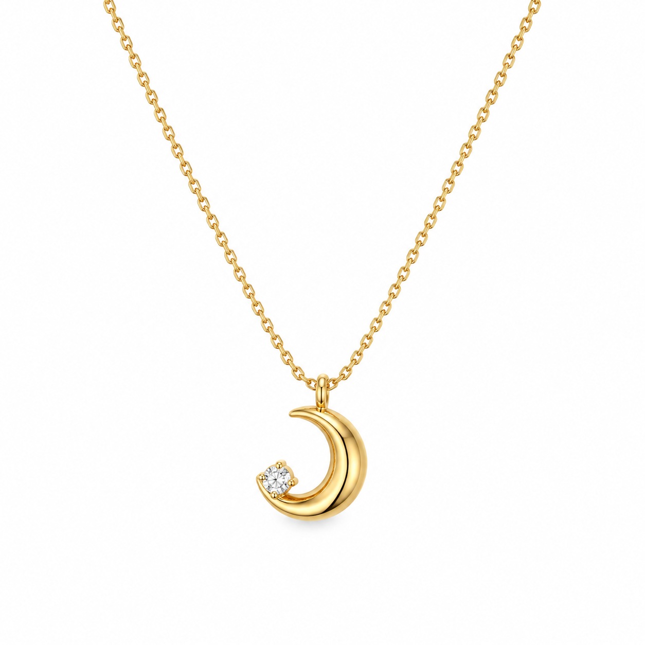 Golden crescent pendant on a clean white studio background